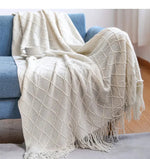 Chaud plaid tricoté à carreaux - Vignette | Couvertures Cosy